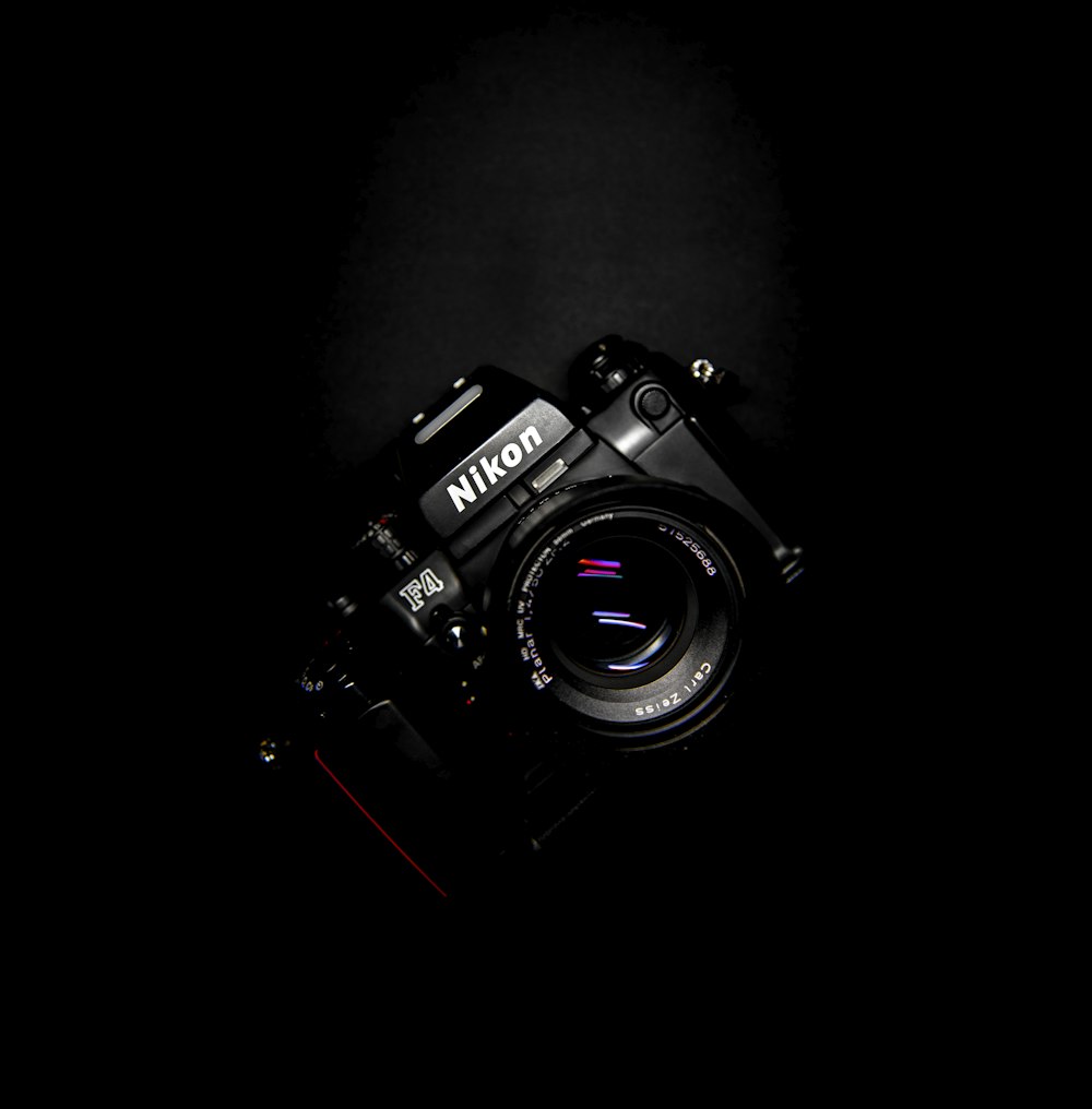 black Nikon DSLR camera