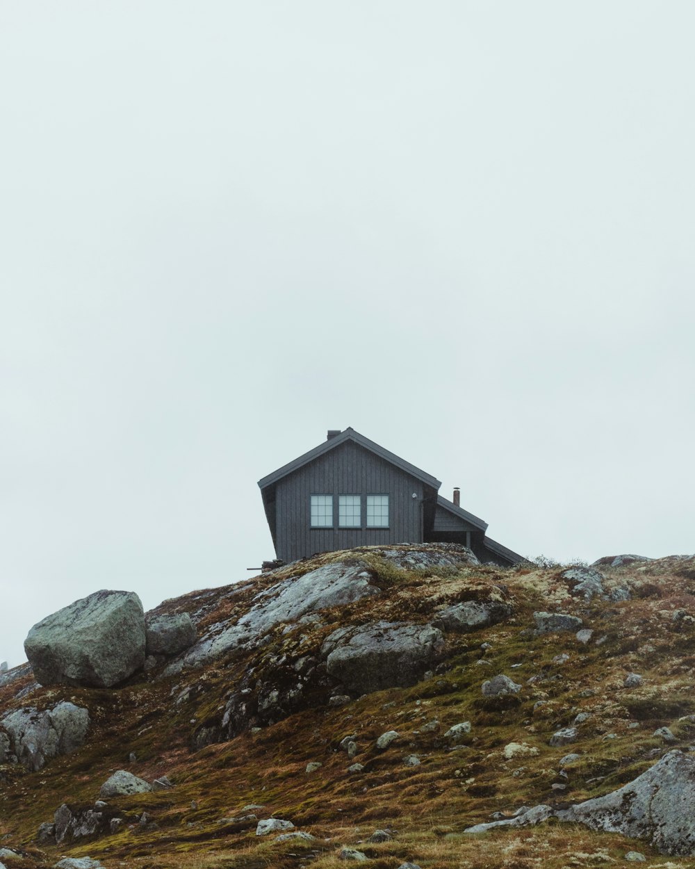 house on hill during daytime