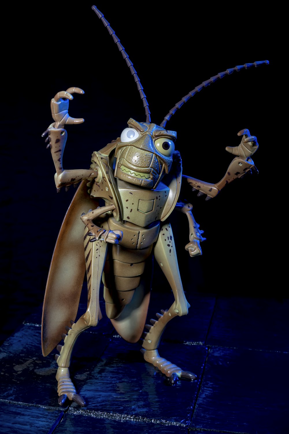 brown grasshopper character action figure