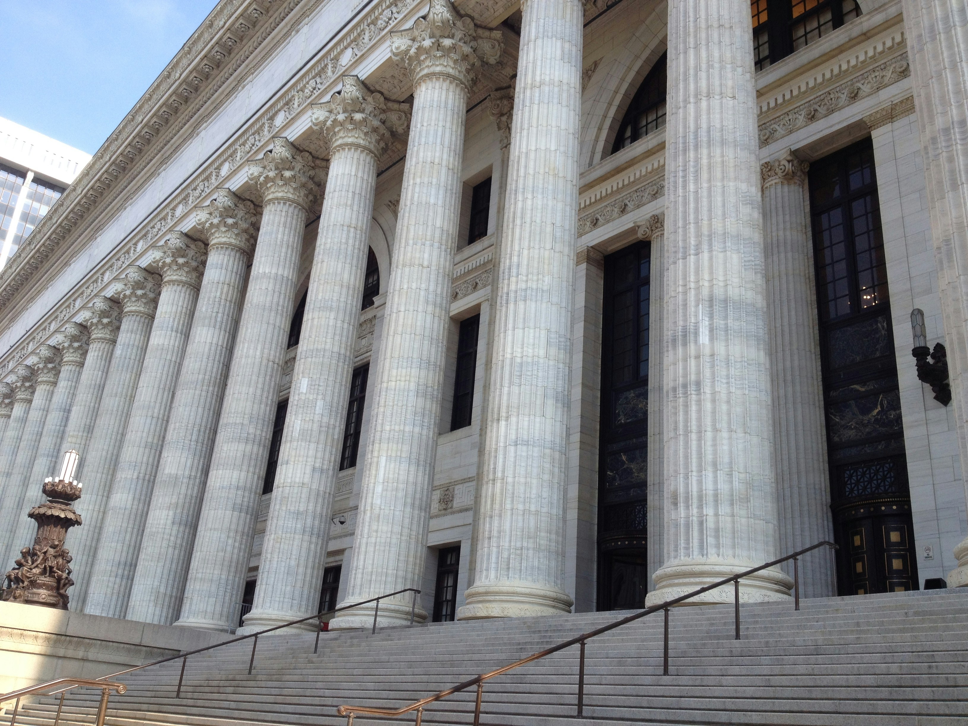Roman posts in Albany at a state building