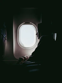 man looking at window