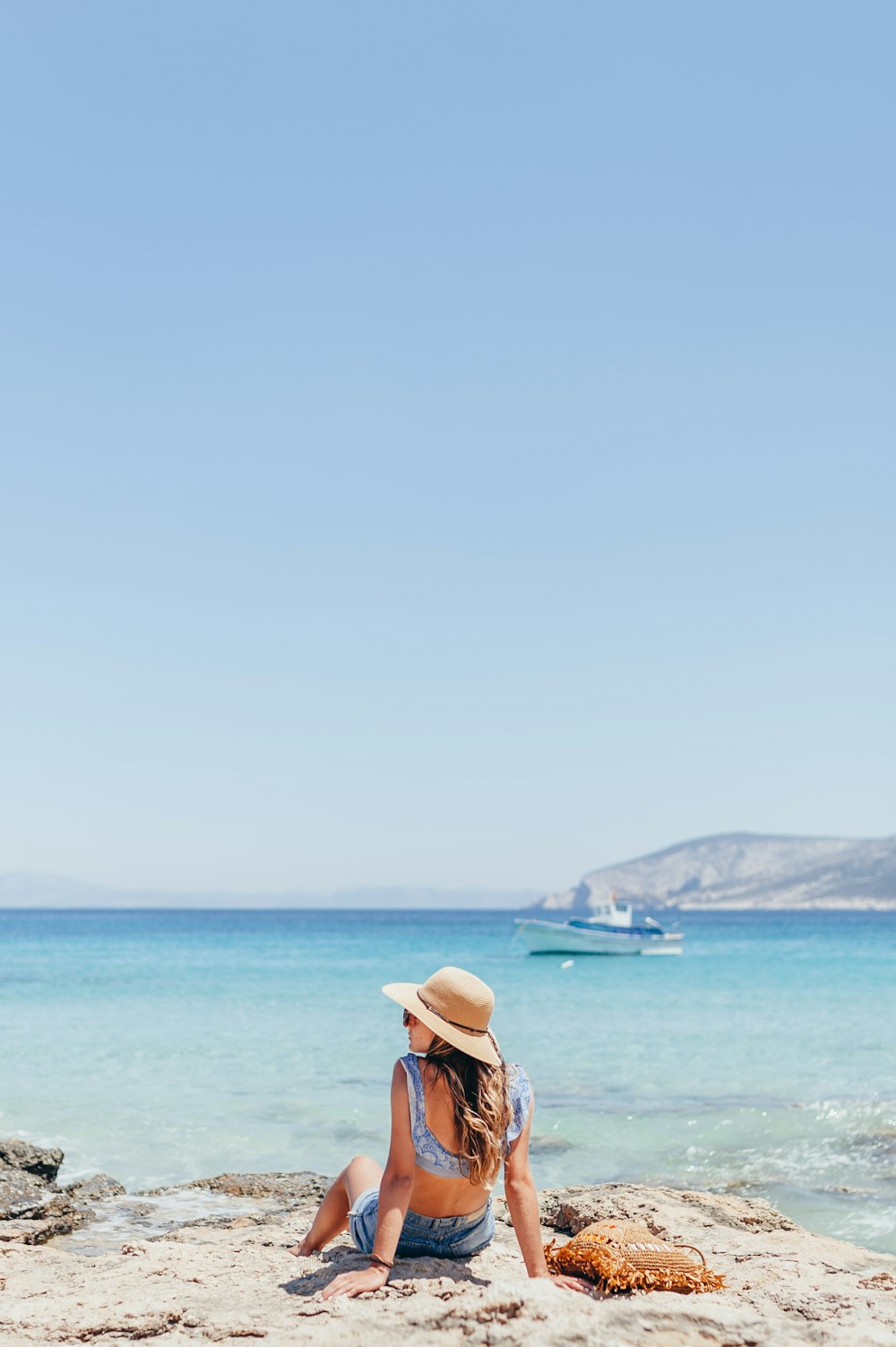 woman siting on seashore