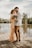 couple standing on dock