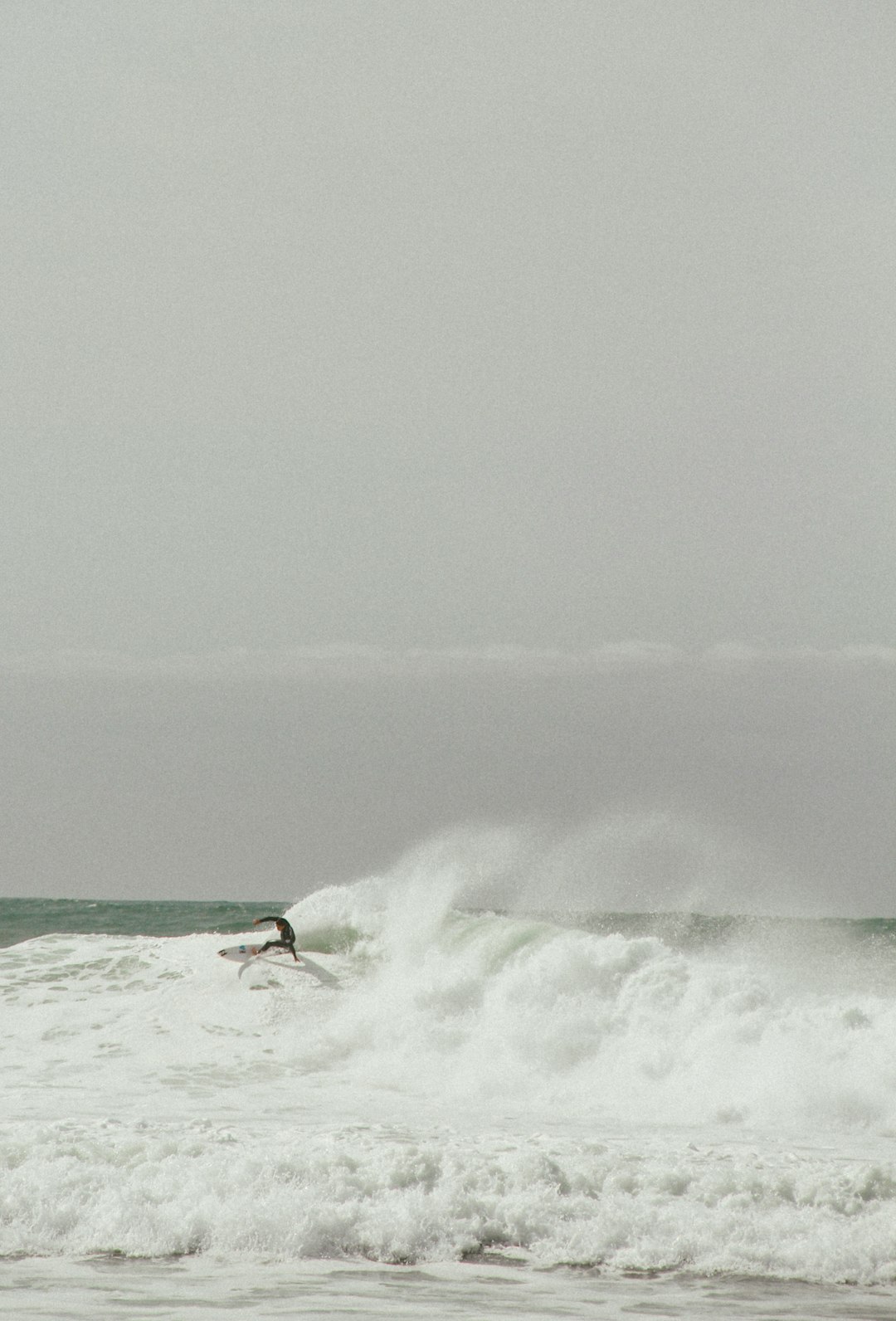 surfing man on huge waves