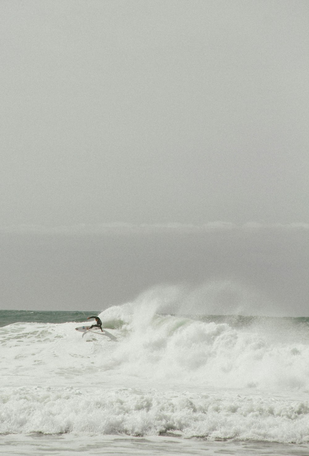 surfing man on huge waves