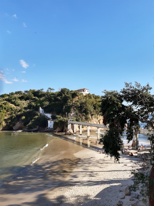 house in a hill near bridge and body of water during daytime in Boa Viagem beach Brasil