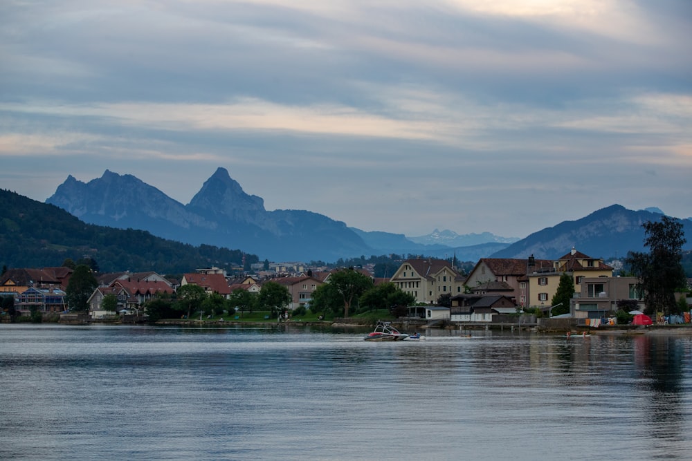 houses near body of water during daytime