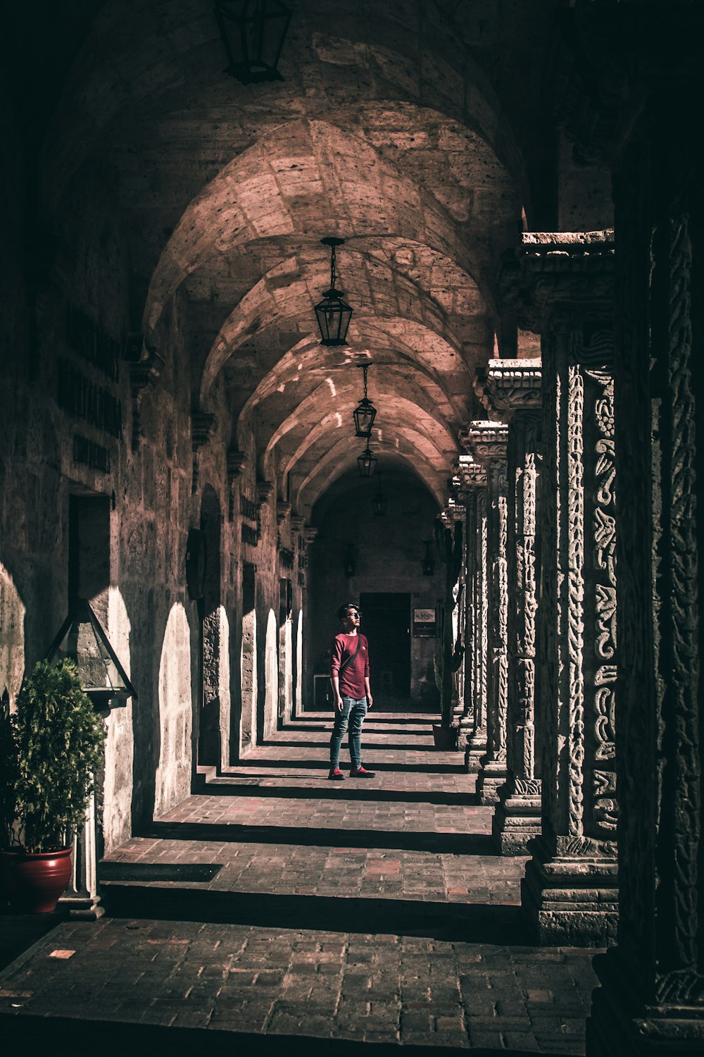 man standing inside building