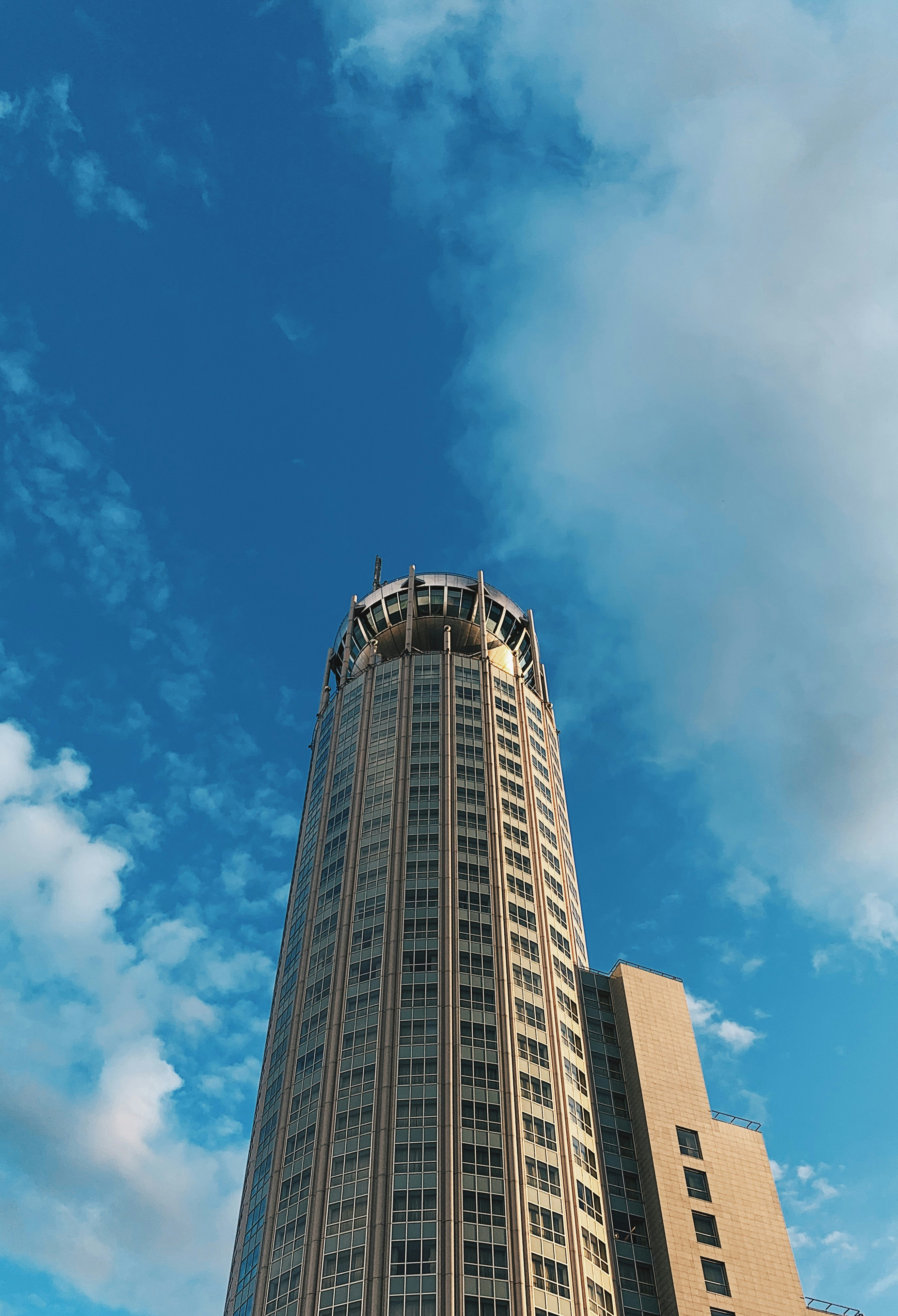 low angle view photography of brown building