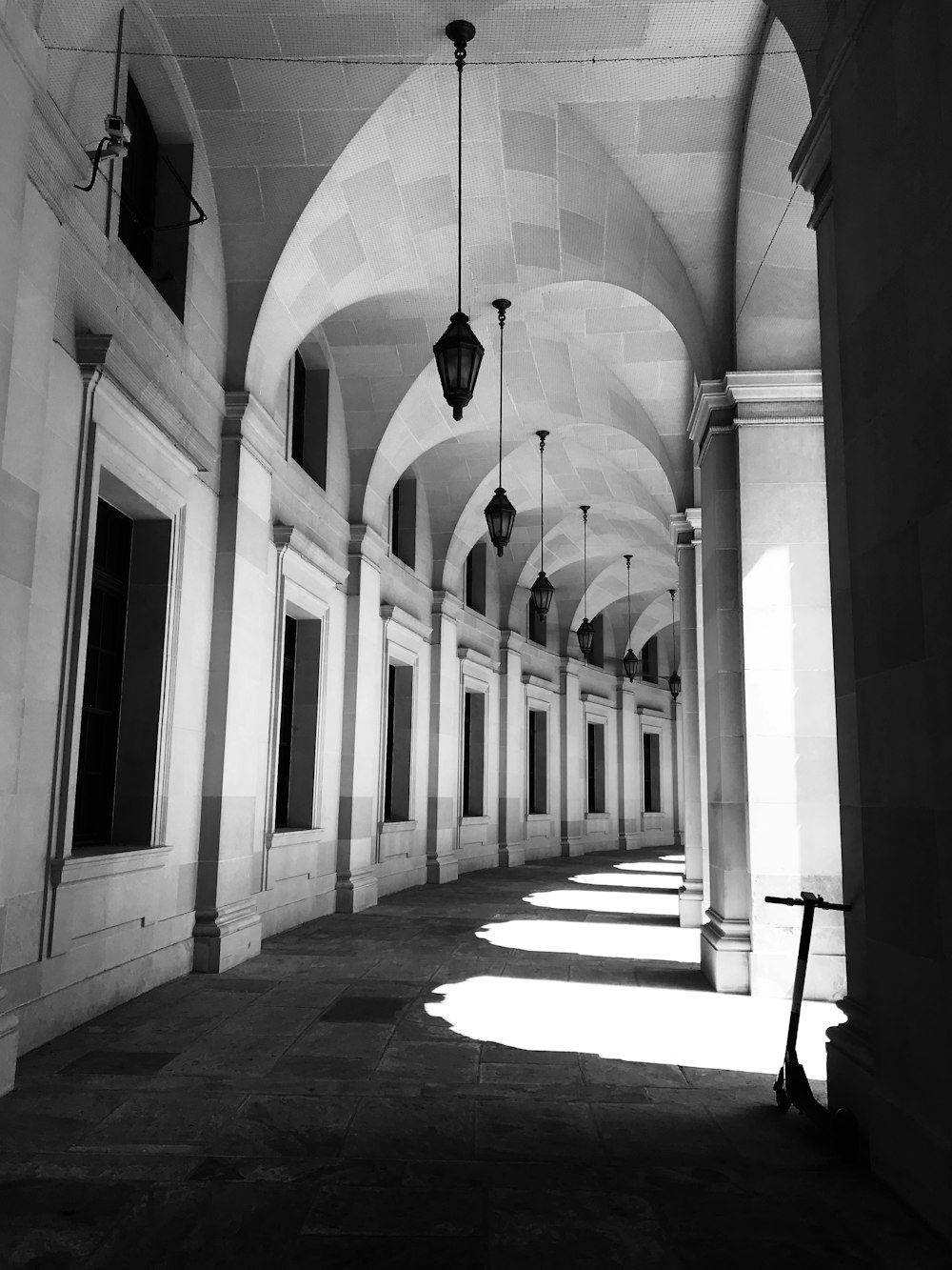 grayscale photo of hallway