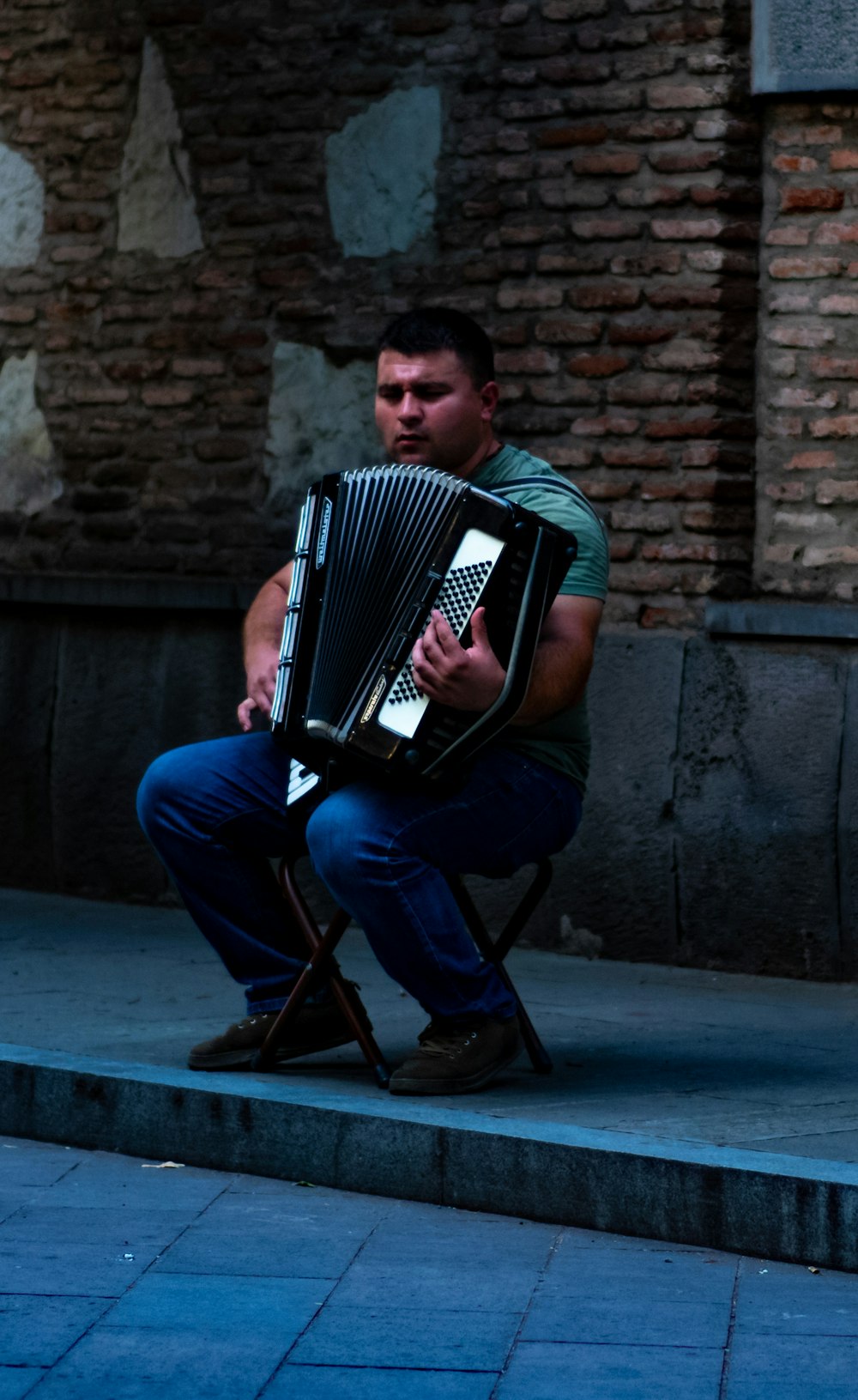 man playing accordion