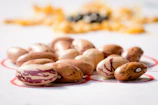 Close-up of fresh beans and lentils spilling from a rustic basket on a wooden table
