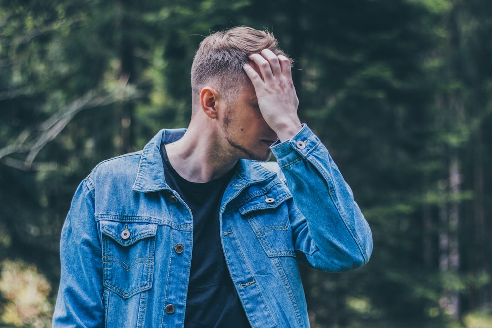 man in blue denim jacket