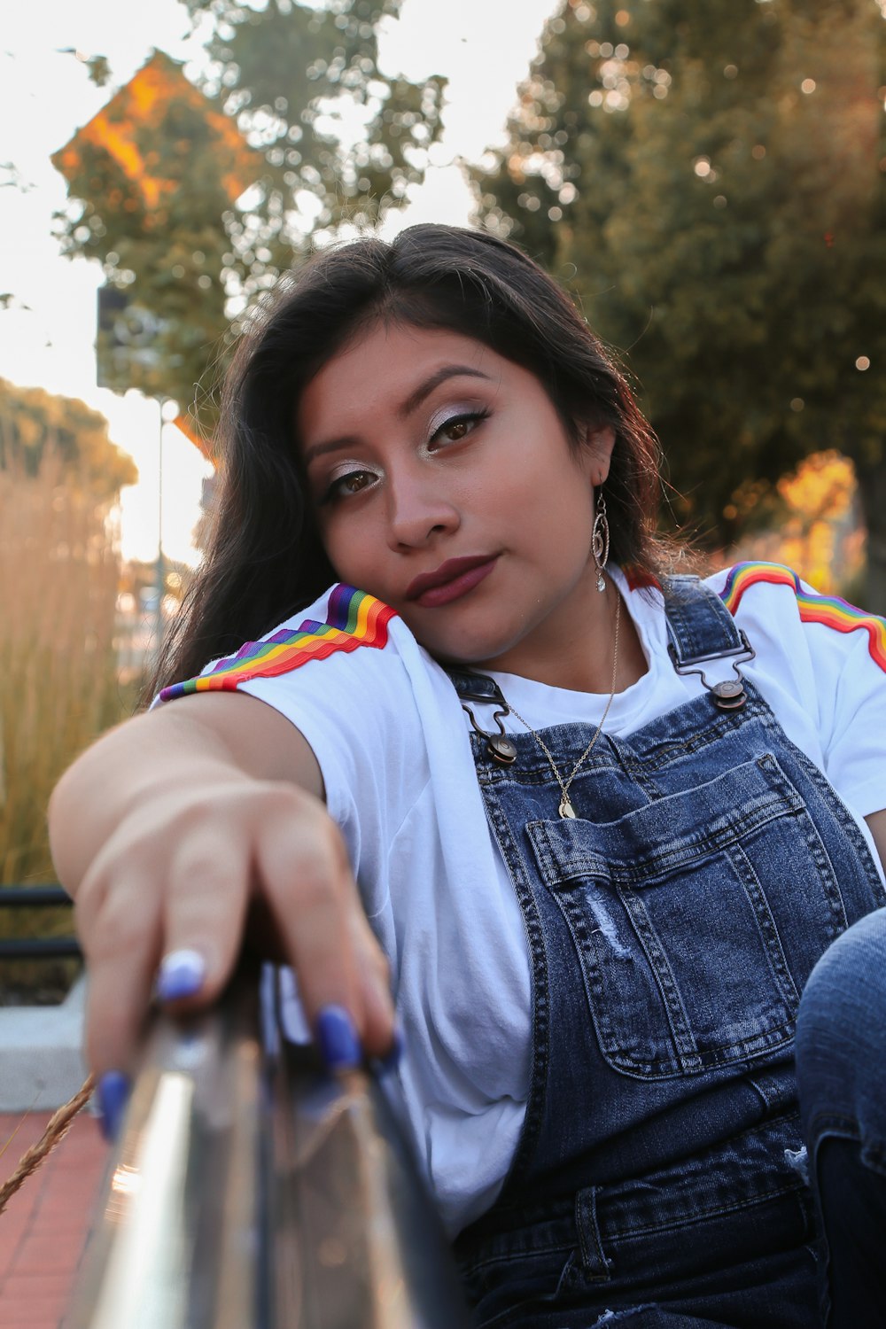 woman wearing blue overalls