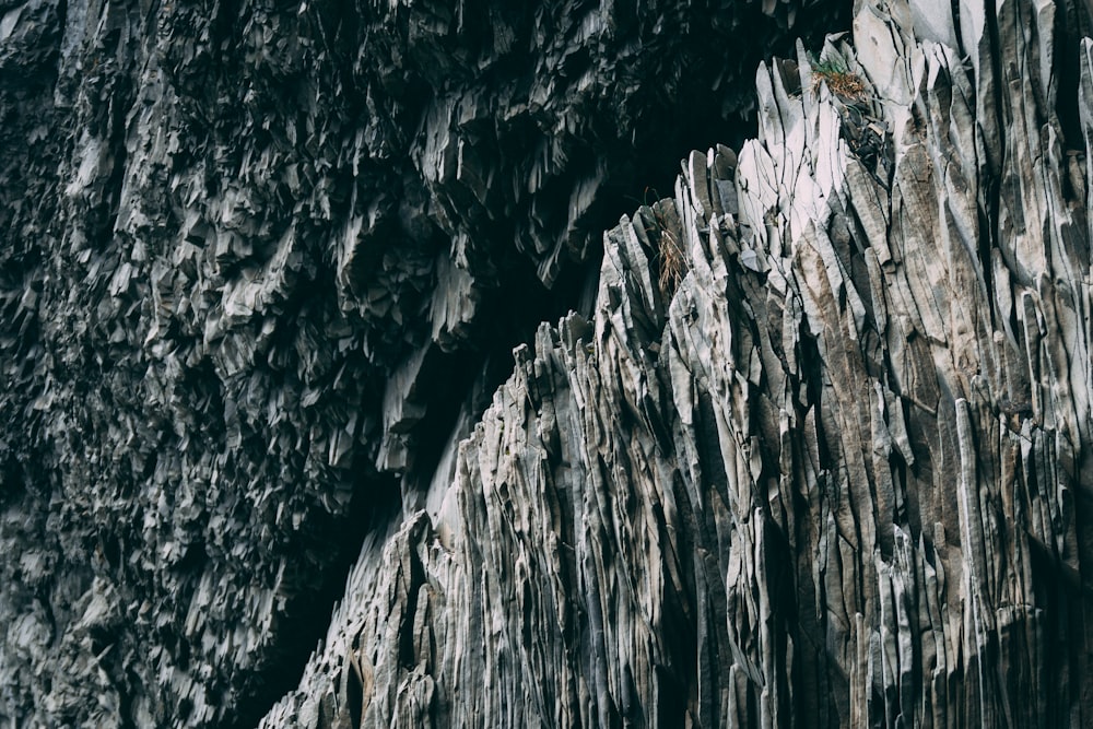 a close up of a rock formation with a sky background