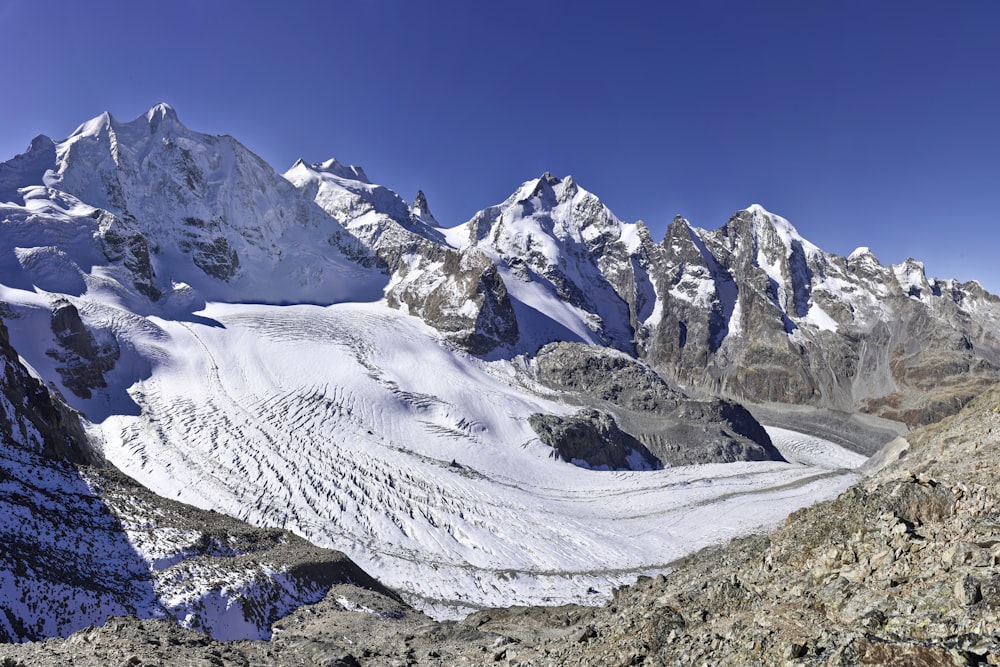 mountain range covered by snow