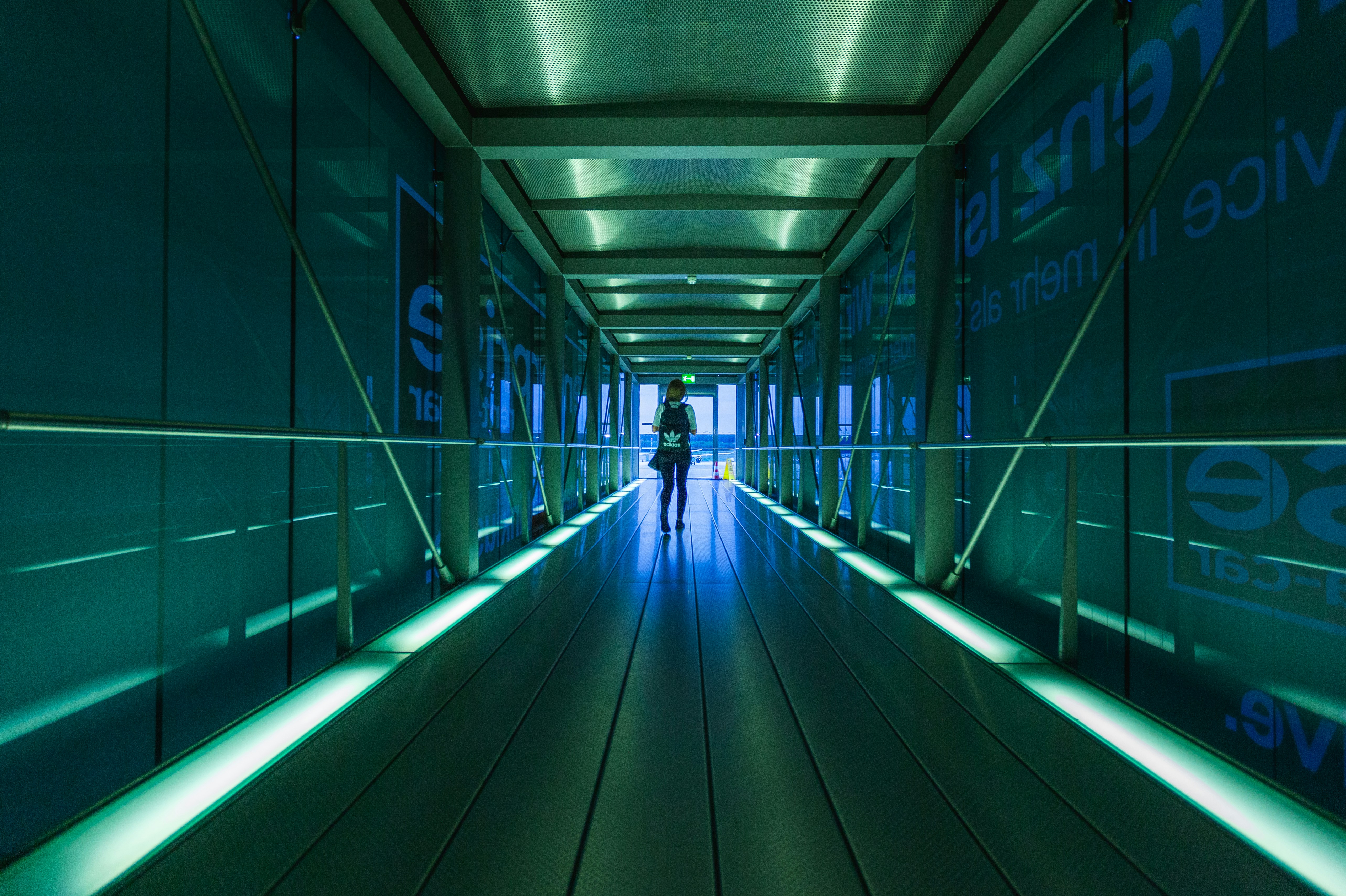 person standing on hallway, Check in terminal airplane