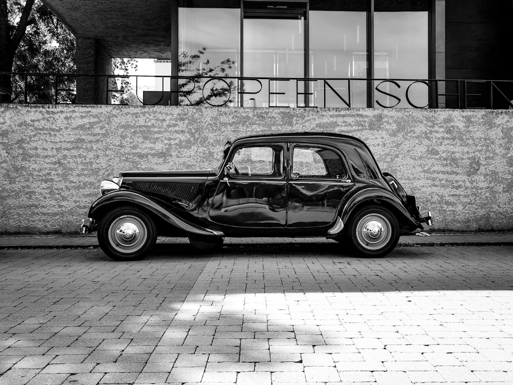 grayscale photography of vehicle