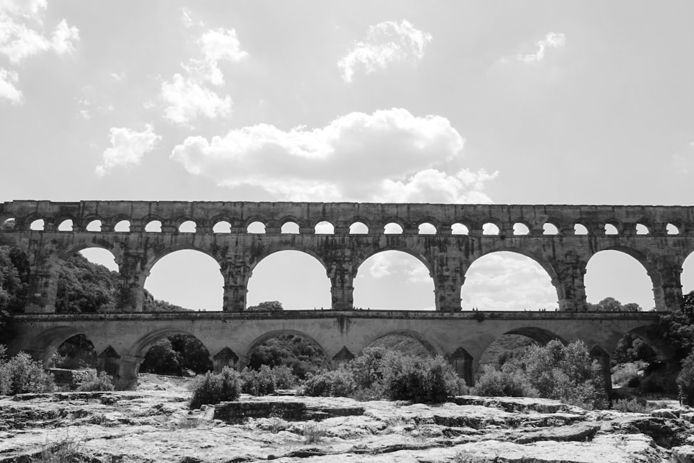 gray scale photography of bridge