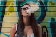 women's black framed sunglasses close-up photography