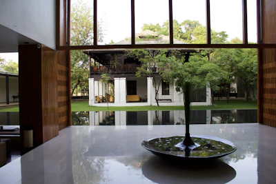 Finished modern garden room seamlessly blending into a lush backyard.