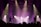 A live music performance with musicians silhouetted against a backdrop of bright stage lights. The scene is framed by beams of purple and yellow light, which enhance the dramatic mood of the concert. A crowd is visible in the foreground, adding to the lively atmosphere.