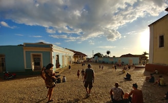 A sunny street scene in a colorful Nicaraguan town with expats enjoying a local café.