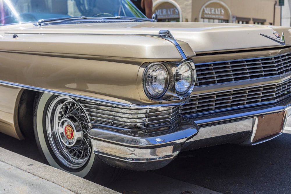 gold-colored vehicle close-up photography