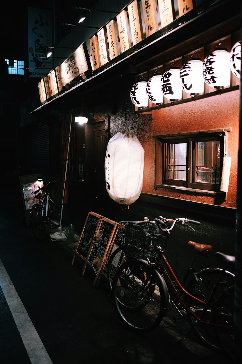 black and brown bicycle at nighttime