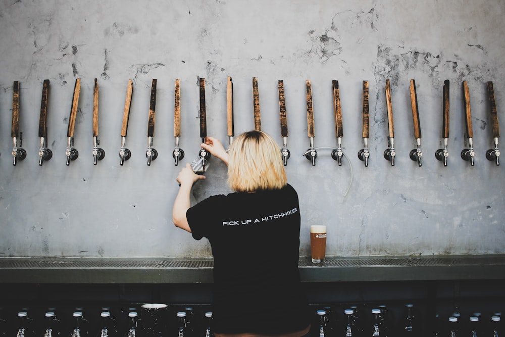 woman wearing black crew-neck shirt