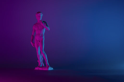 Deep blue background with silhouettes of Plato and Aristotle in Renaissance style.