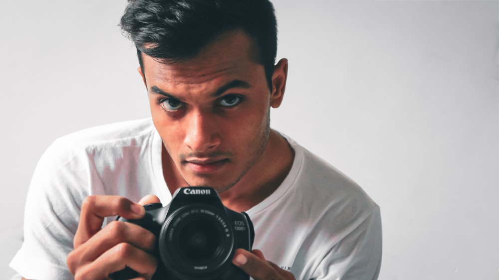 man holding camera