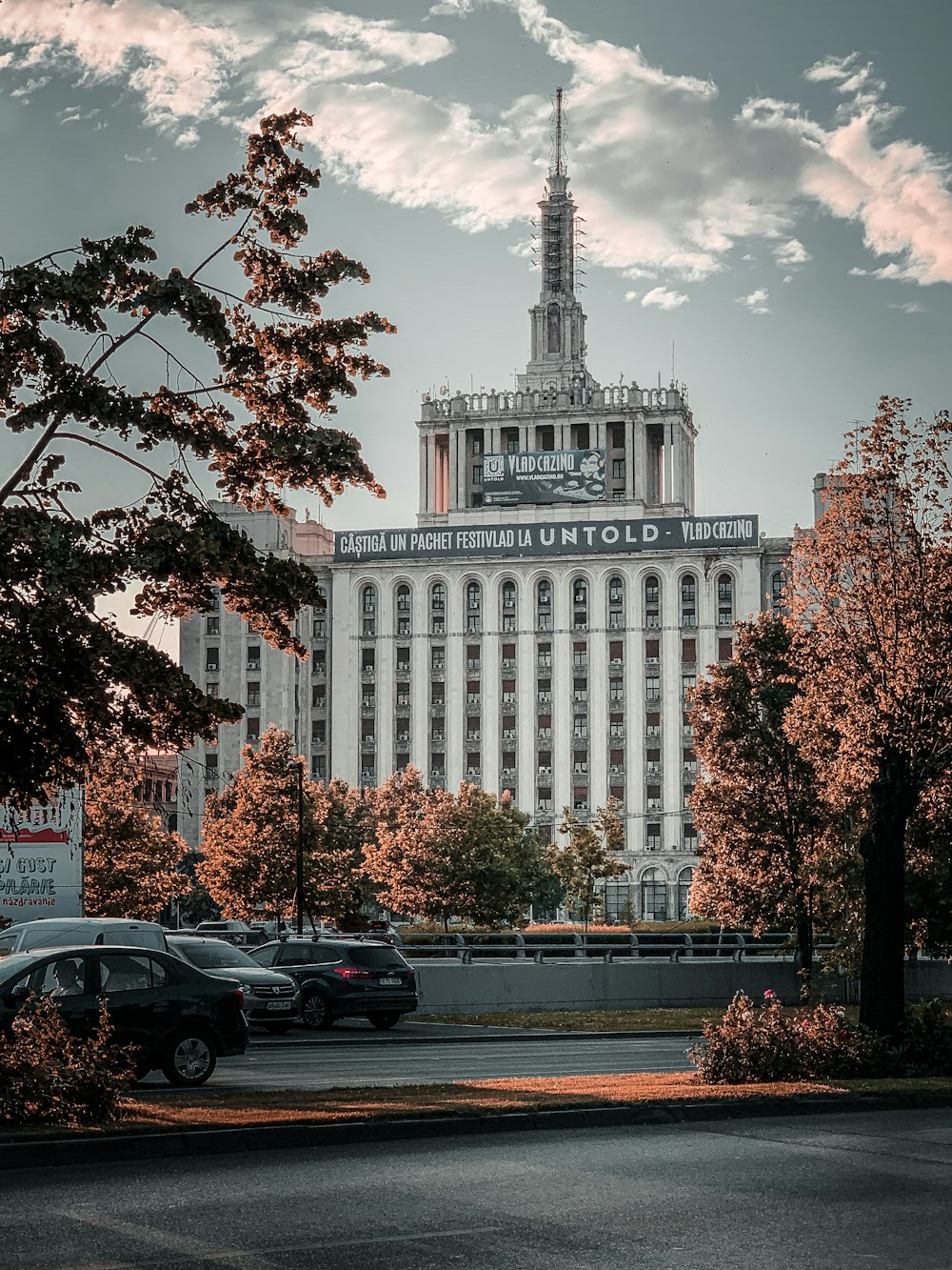 cars across white building