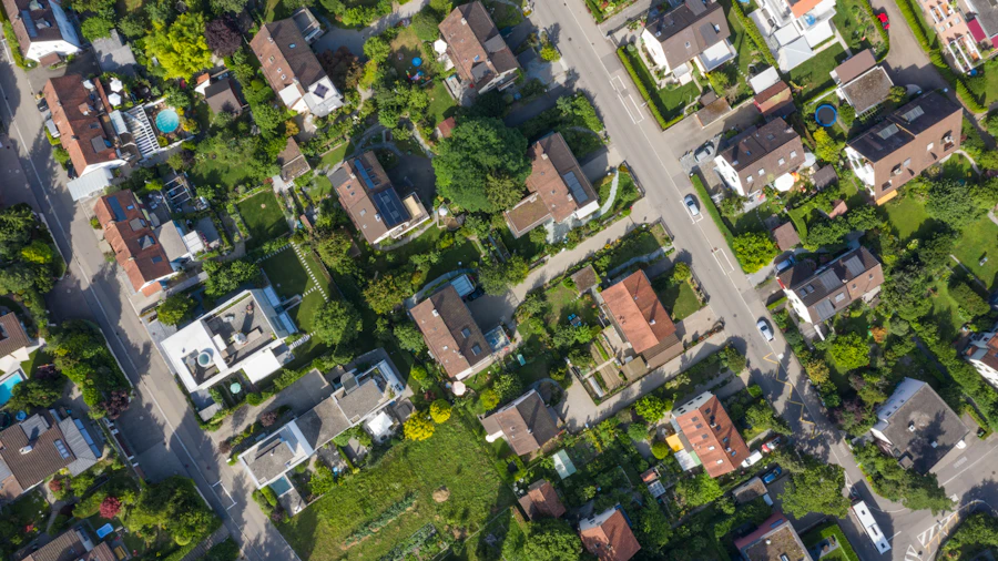 Aerial view of a coastal housing estate near the ocean.