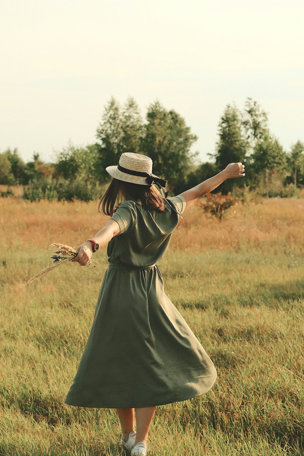 woman wearing blue tank dress