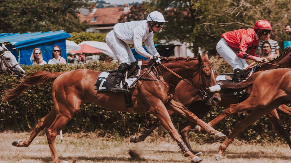 person riding running horse