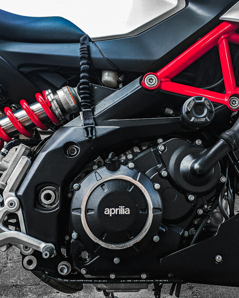 black Aprilia motorcycle engine