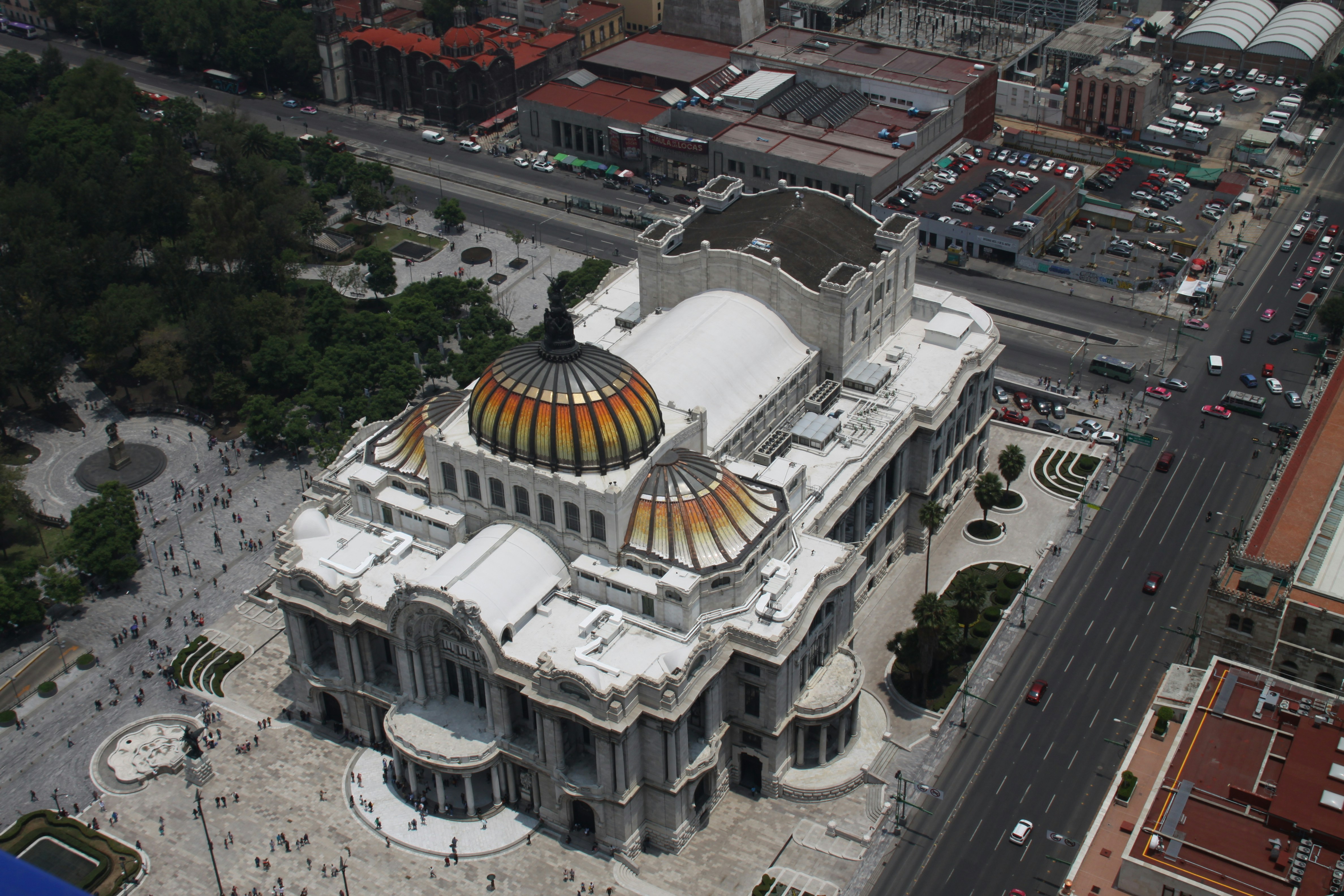 an aerial view of a large building with a dome