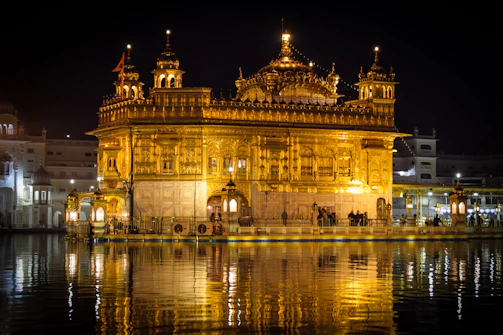 A serene photo of Govind Dev Ji temple bathed in early morning light.