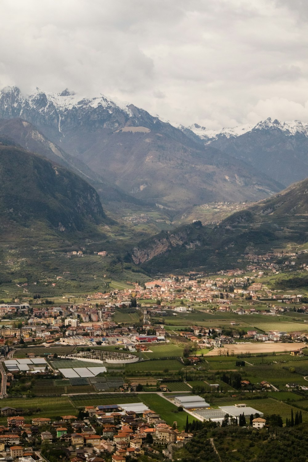 a view of a small town in the mountains