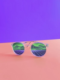 white framed sunglasses close-up photography