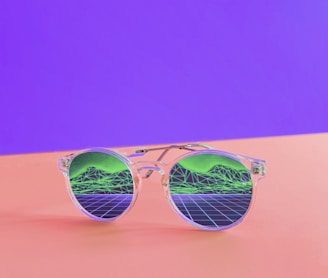 white framed sunglasses close-up photography