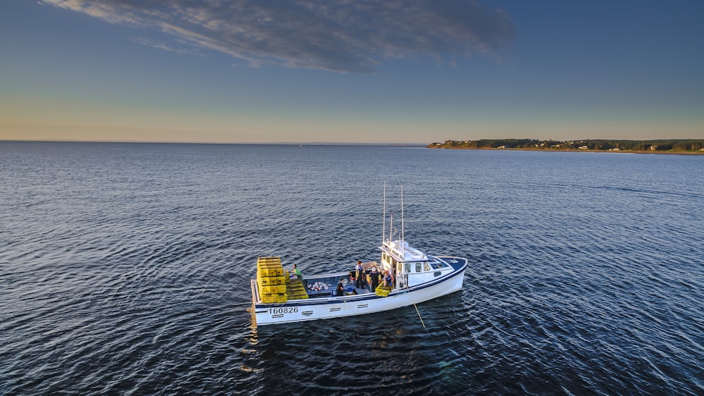 a boat with people on it in the water