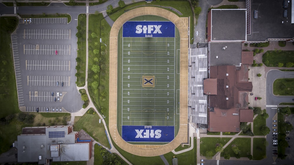 an aerial view of a football field with a sky background