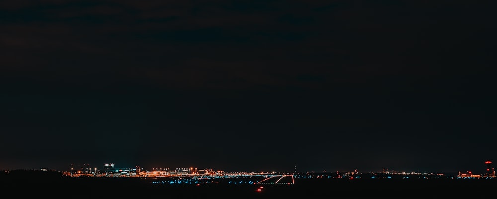 a view of a city at night from across the water