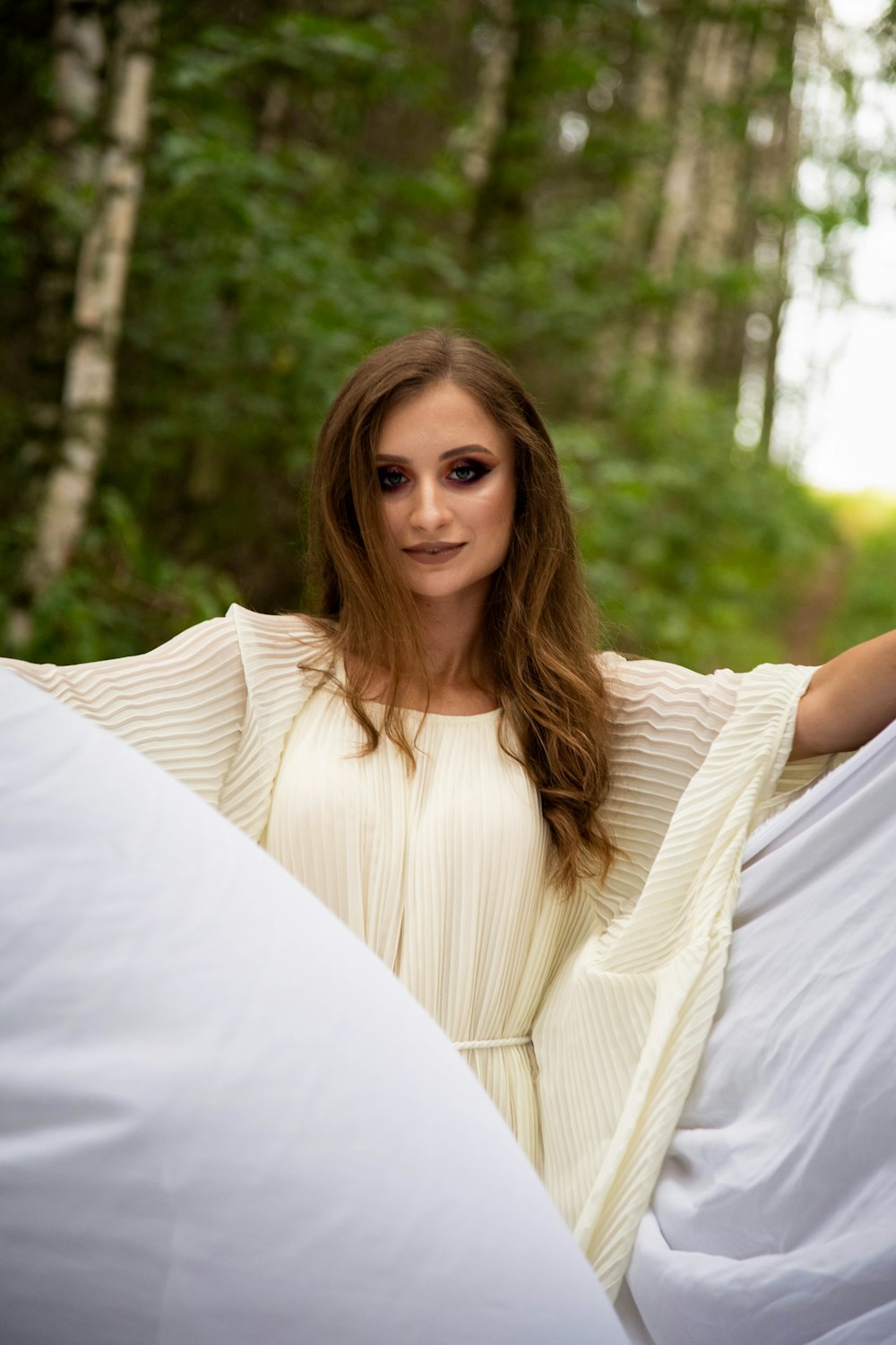 woman wearing white gown