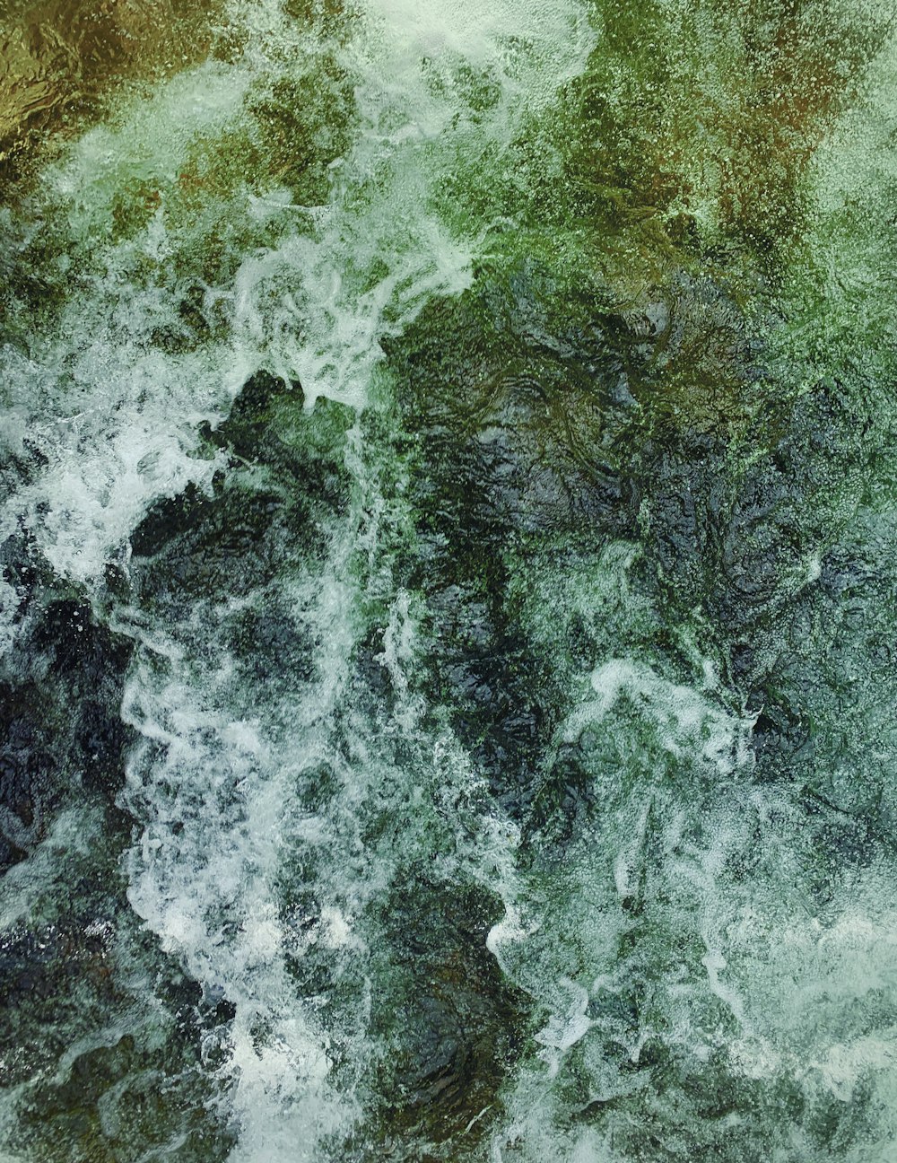 a large body of water surrounded by rocks