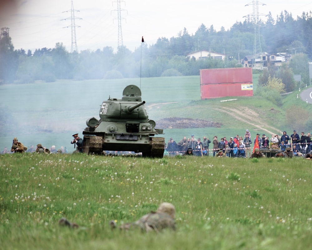 gray tank on green grass