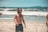 topless man on beach