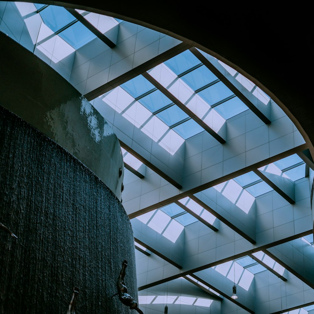 a large shower with a skylight above it